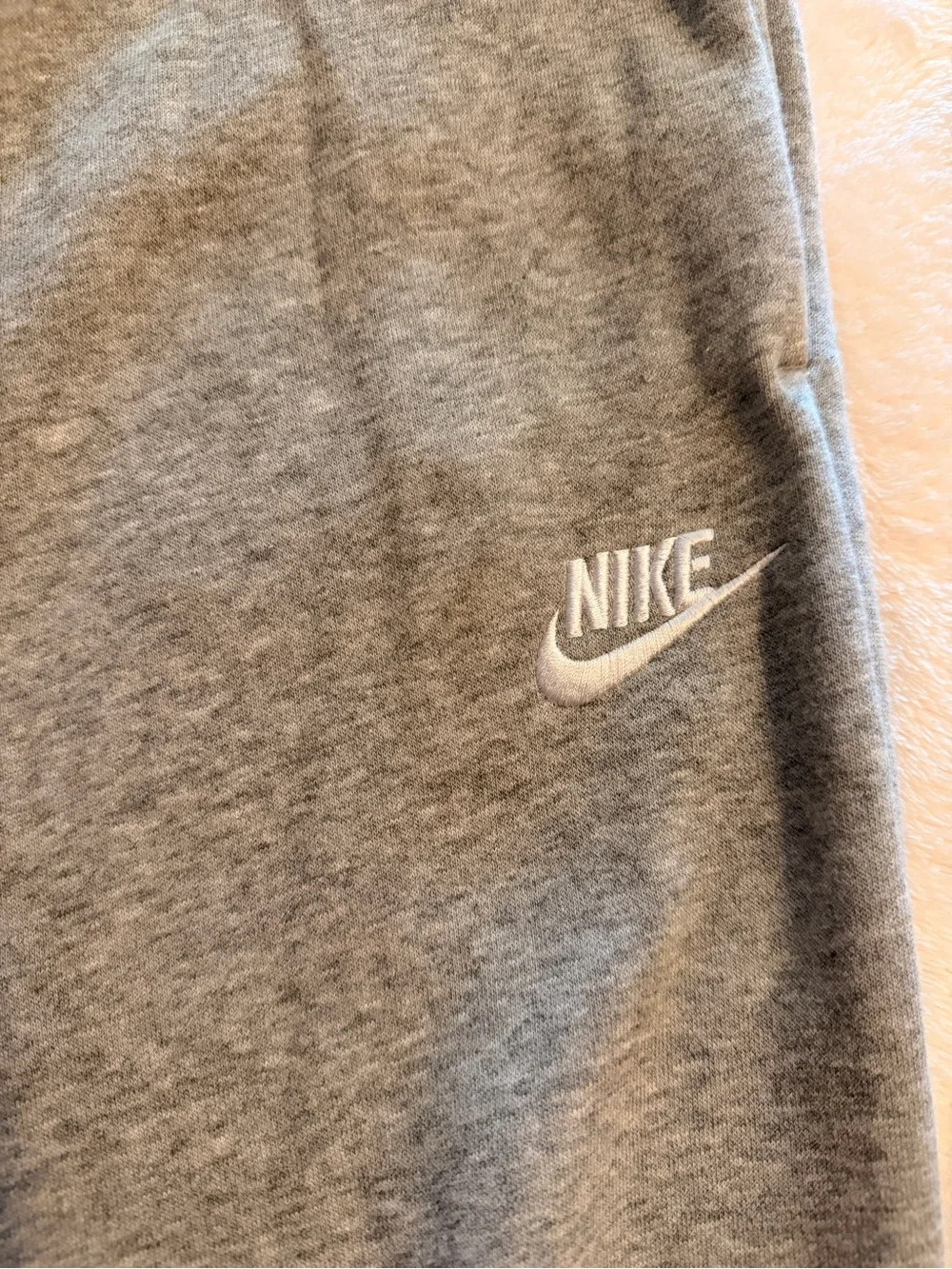 Nike Men's Light Gray Fleece Joggers with White Swoosh